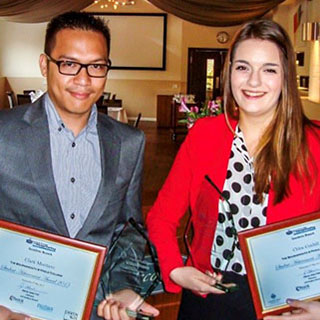 Clark Montano, an International student from the Philippines (left) with fellow winner Chloe Coxhill