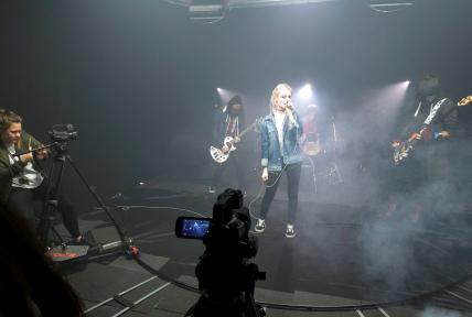 Students performing in music video
