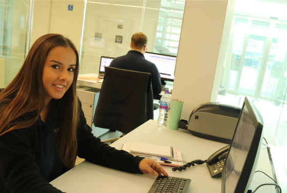 Business Administration apprentice in work environment
